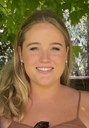 Bronte Palmer Orange Pilates Instructor